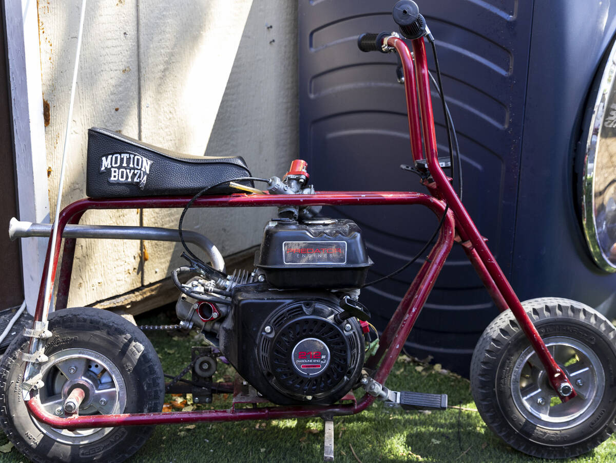 The minibike that Angel Naranjo rode when he struck a cable and died is seen in the backyard of ...