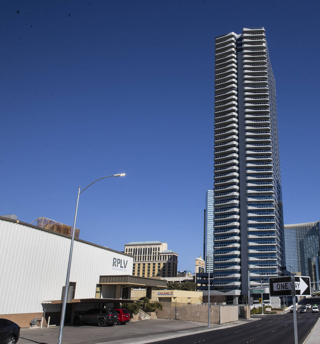 Royal Pacific of Las Vegas, left, a screen print/embroidery shop, and the Martin condo tower ar ...