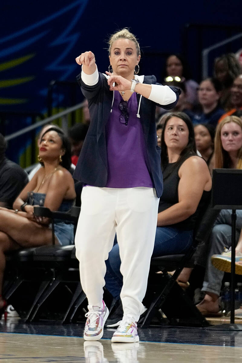 Las Vegas Aces head coach Becky Hammon instructs her team in the first half of a WNBA basketbal ...