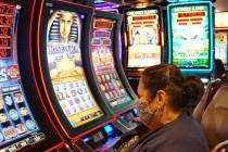 Ramona Trejo plays a slot machine at the Hard Rock Hotel & Casino Lake Tahoe in Stateline, Nev. ...