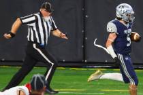 The Meadows' Evan Baalbaky (5) runs the ball to score a touchdown against Lincoln County during ...