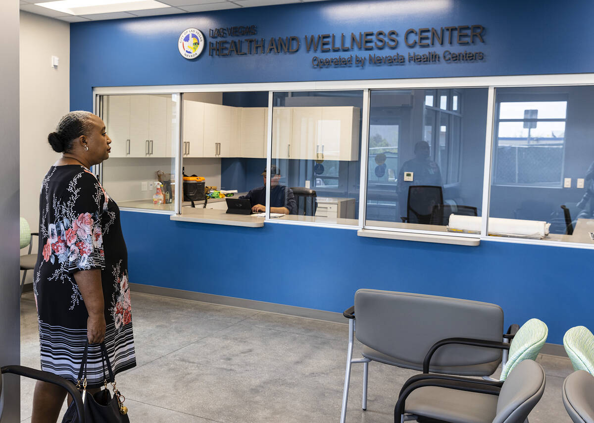 Jocelyn Bluitt-Fisher, community resource manager, leads a tour of Las Vegas Health and Wellnes ...