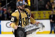 Golden Knights center Chandler Stephenson (20) celebrates with the Stanley Cup after winning th ...