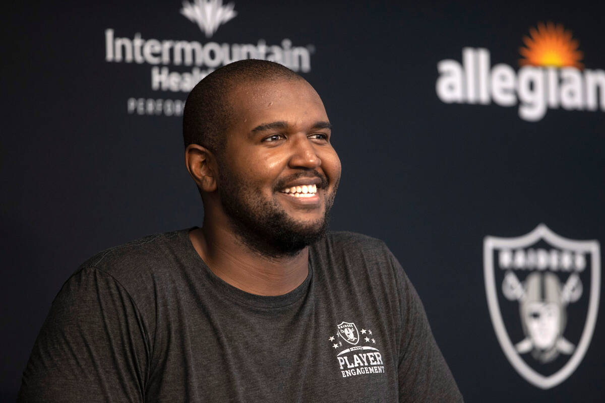 Raiders offensive tackle Brandon Parker smiles during a news conference following the team  ...