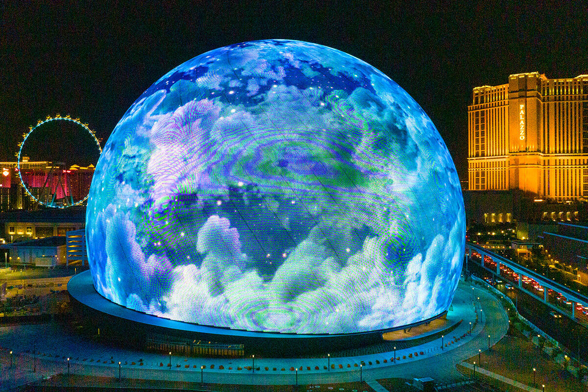 The Sphere illuminates the Las Vegas skyline, on Monday, July 31, 2023, in Las Vegas. (Bizuayeh ...