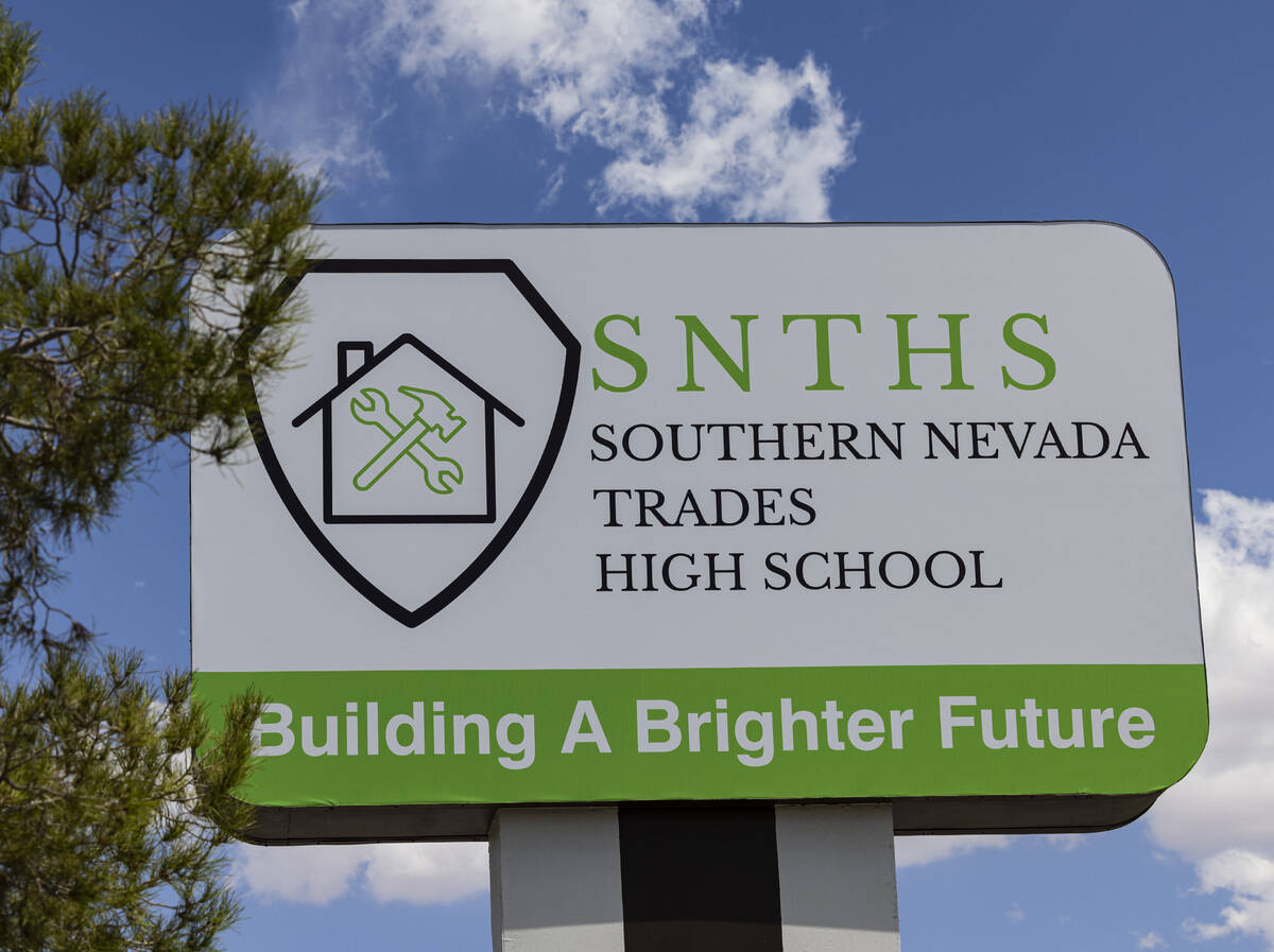 The Southern Nevada Trades High School sign is seen at the campus, on Friday, Aug 11, 2023, in ...