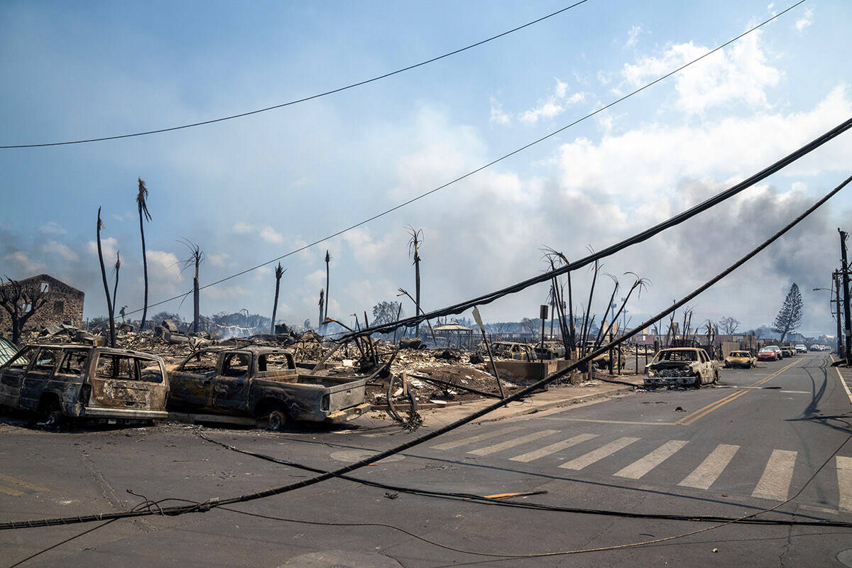 Wildfire wreckage is seen Wednesday, Aug. 9, 2023, in Lahaina, Hawaii. The scene at one of Maui ...