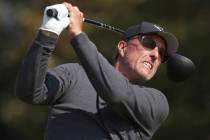 Phil Mickelson plays from the fifth tee on the first day of the British Open Golf Championships ...