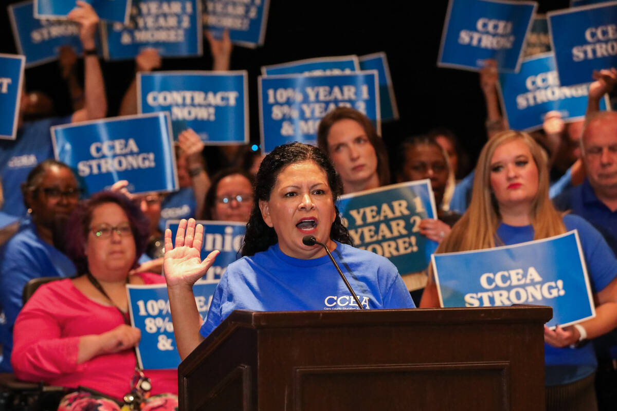 Marie Neisess, president of the Clark County Education Association, speaks alongside other teac ...