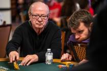 Billy Baxter throws chips into the pot during Day 1A of the $10,000 buy-in Main Event at the Wo ...