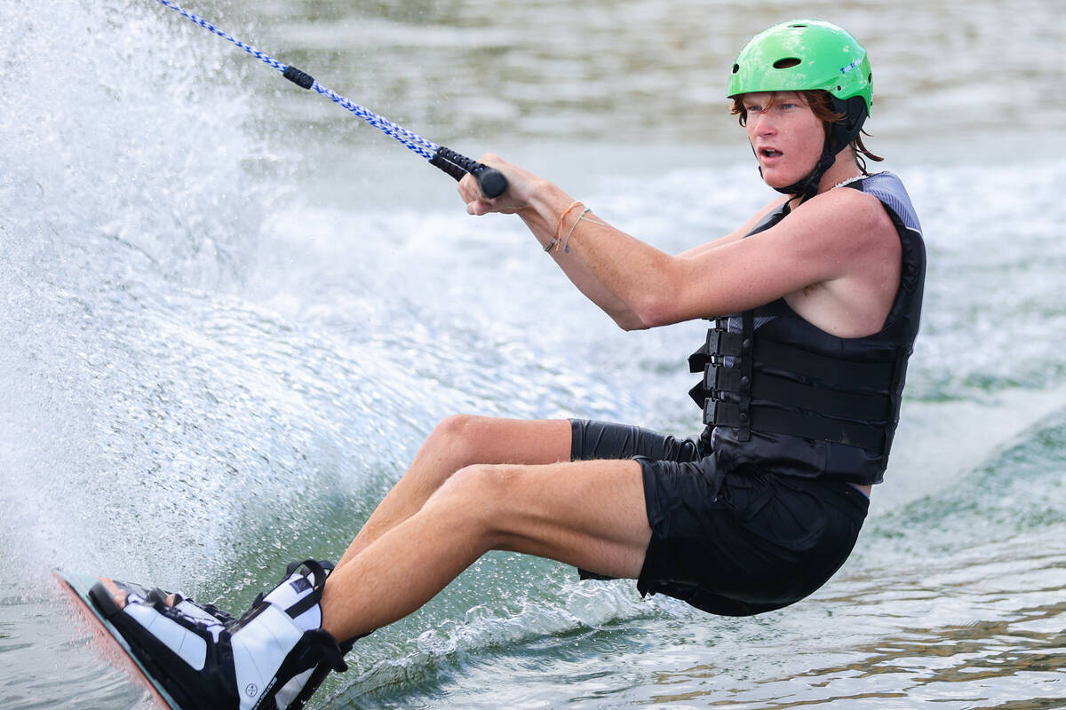 Ian Dross makes some turns on a wakeboard rented out through Lake Las Vegas Water Sports at Lak ...