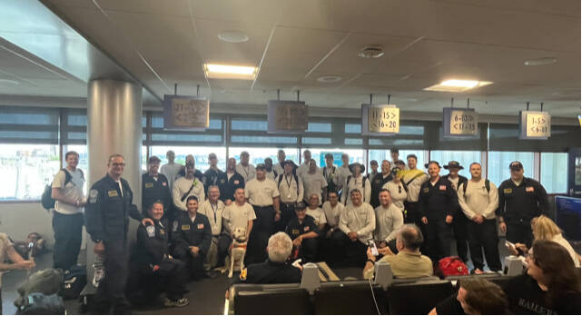 Members of Nevada Task Force-1 at Harry Reid International Airport before their departure for M ...