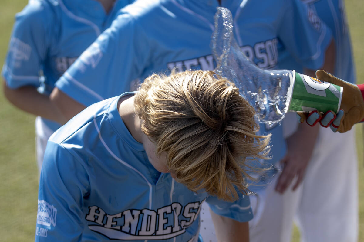 Henderson pitcher Nolan Gifford is showered with water after pitching a no-hitter to Utah in th ...