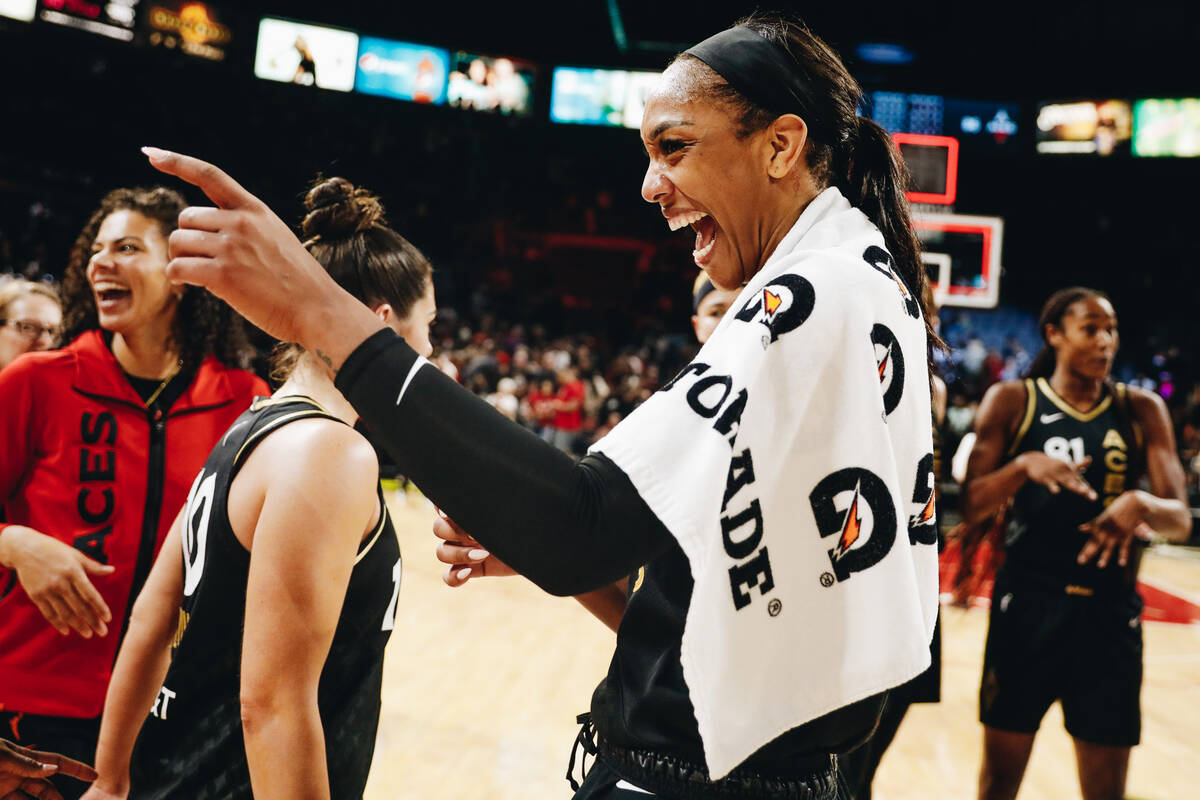 Aces center A’ja Wilson messes around with players on the court after beating the Atlant ...