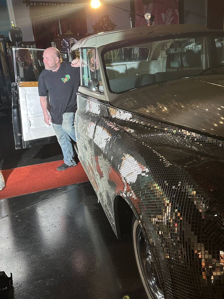 Carrot Top's personal assistant Jeff Molitz is shown with Liberace’s 1962 Rolls-Royce Phantom ...