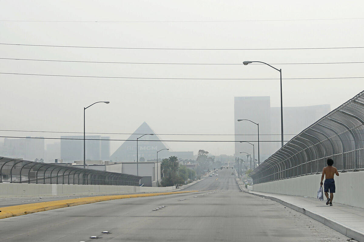 The Strip is seen through a haze of smoke in Las Vegas on Aug. 7, 2021. (Chitose Suzuki / Las V ...