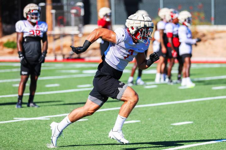 UNLV linebacker Jackson Woodard (7) runs through drills at a UNLV football practice on Monday, ...