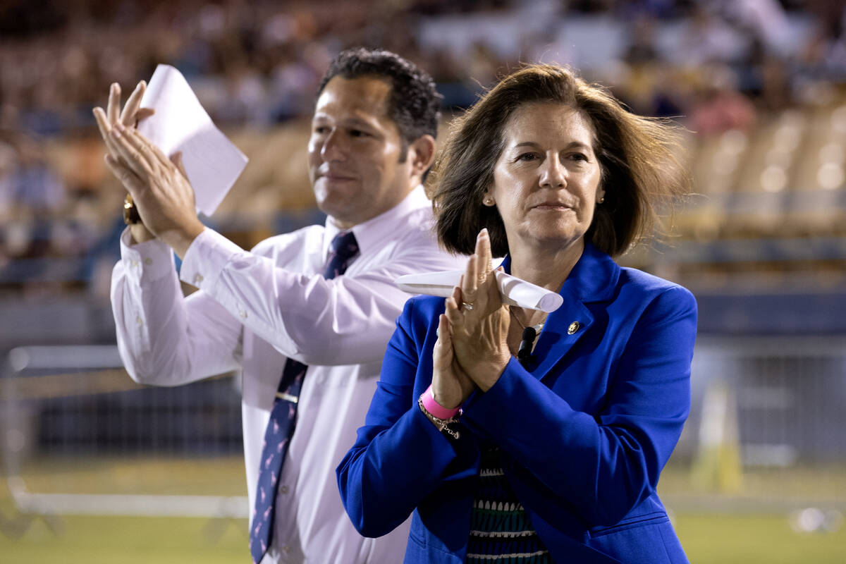 Sen. Catherine Cortez Masto, D-Nev., claps as 250 new U.S citizens take the field for a natural ...