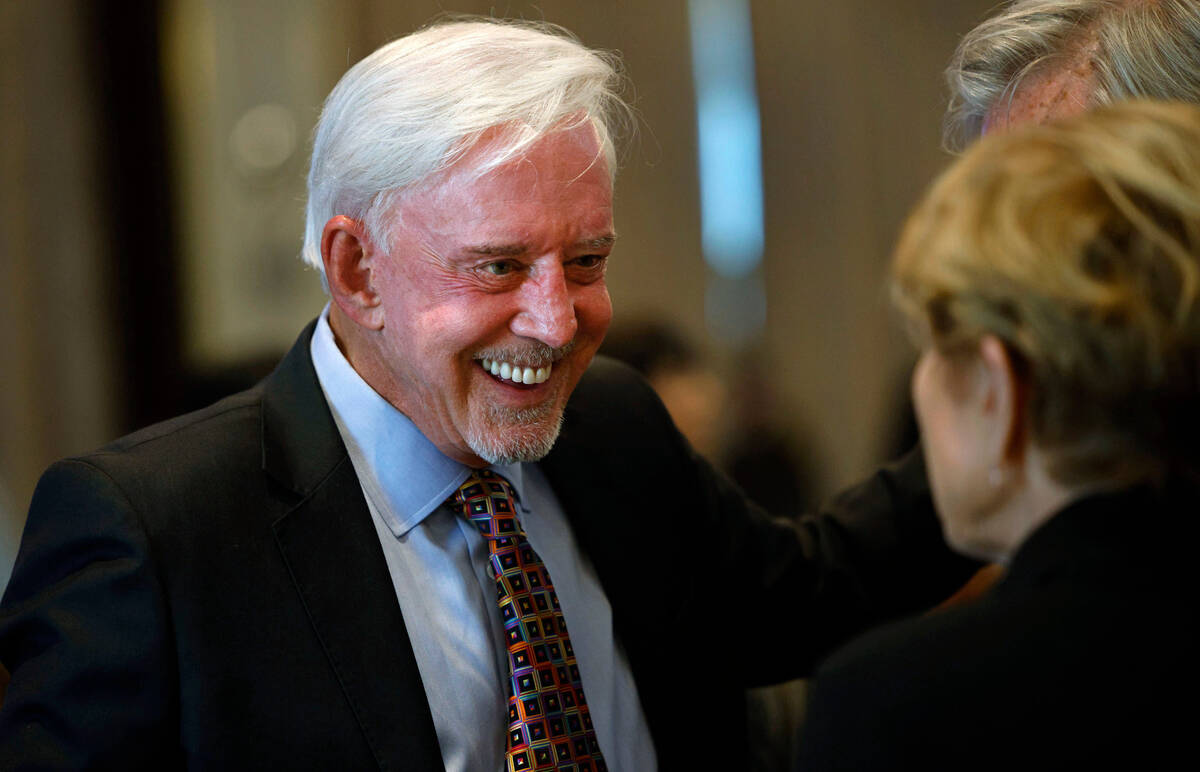 Billy Walters speaks to a guest during an event of Hope for Prisoners, “ A Night of Seco ...