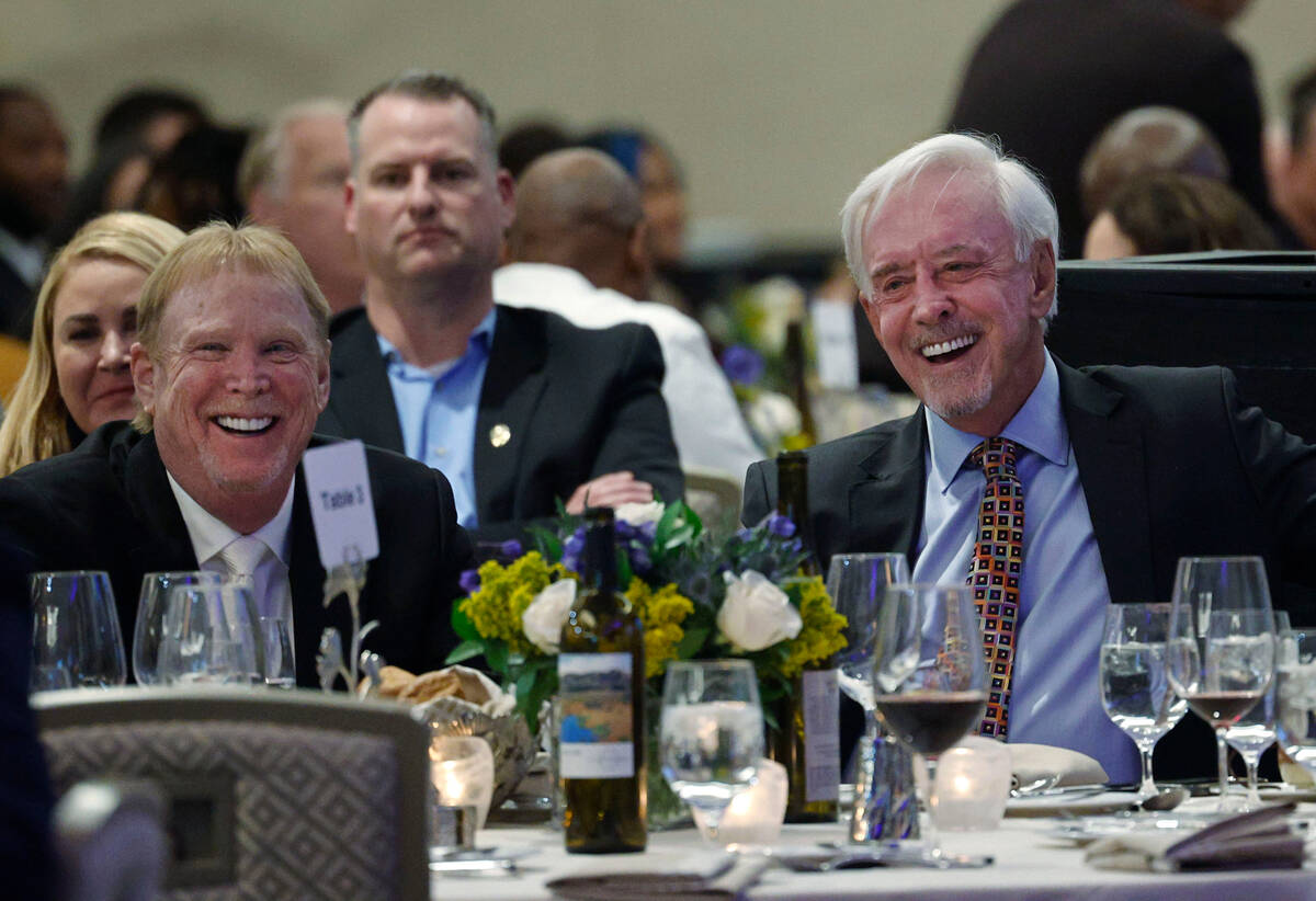Raiders owner Mark Davis, left, and Billy Walters share a laugh during an event of Hope for Pri ...