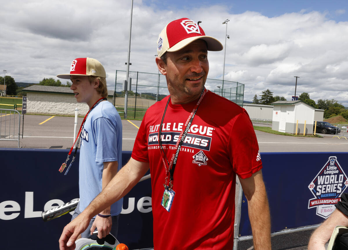 Henderson Little League coach Ryan Gifford, right, speaks during an interview with the Review-J ...