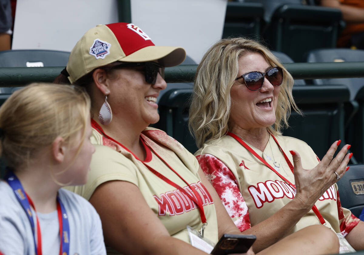Henderson City Mayor Michelle Romero, right, and Lacee Daniel, center, watch a baseball game b ...