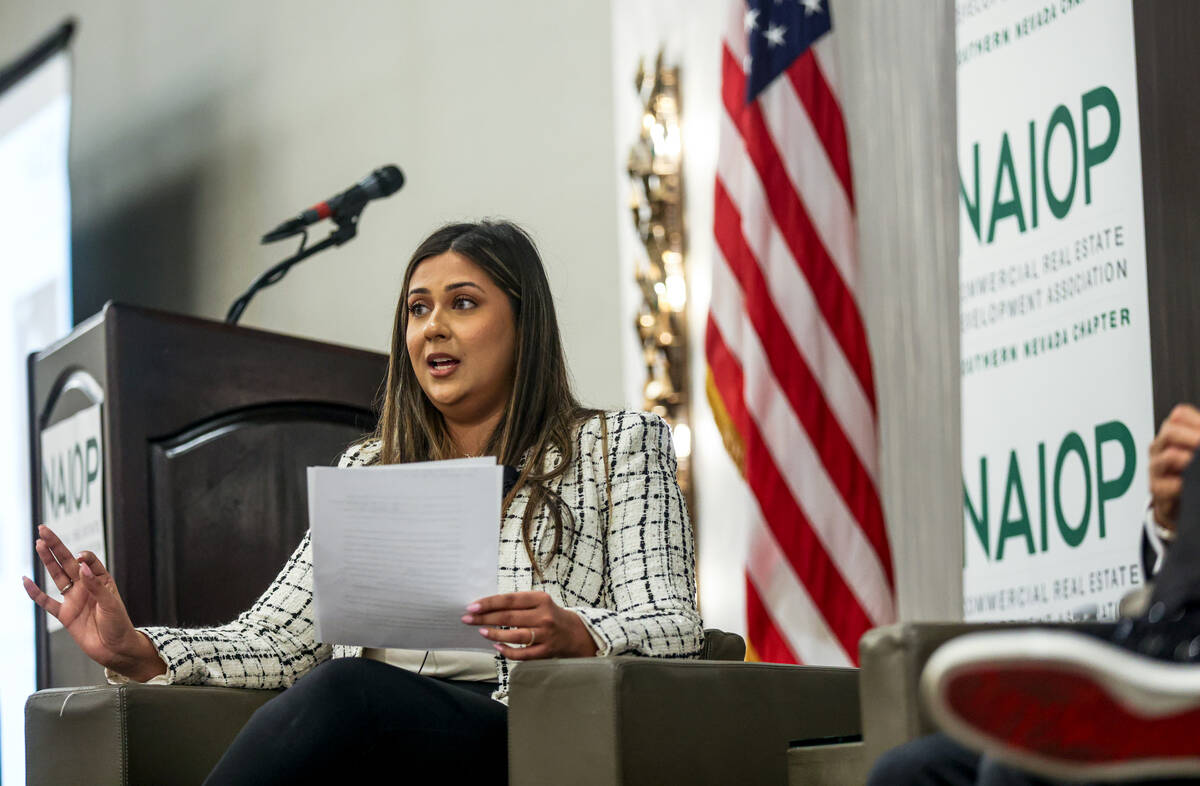 Areeba Moten, senior associate with Colliers International, moderates a panel about experientia ...