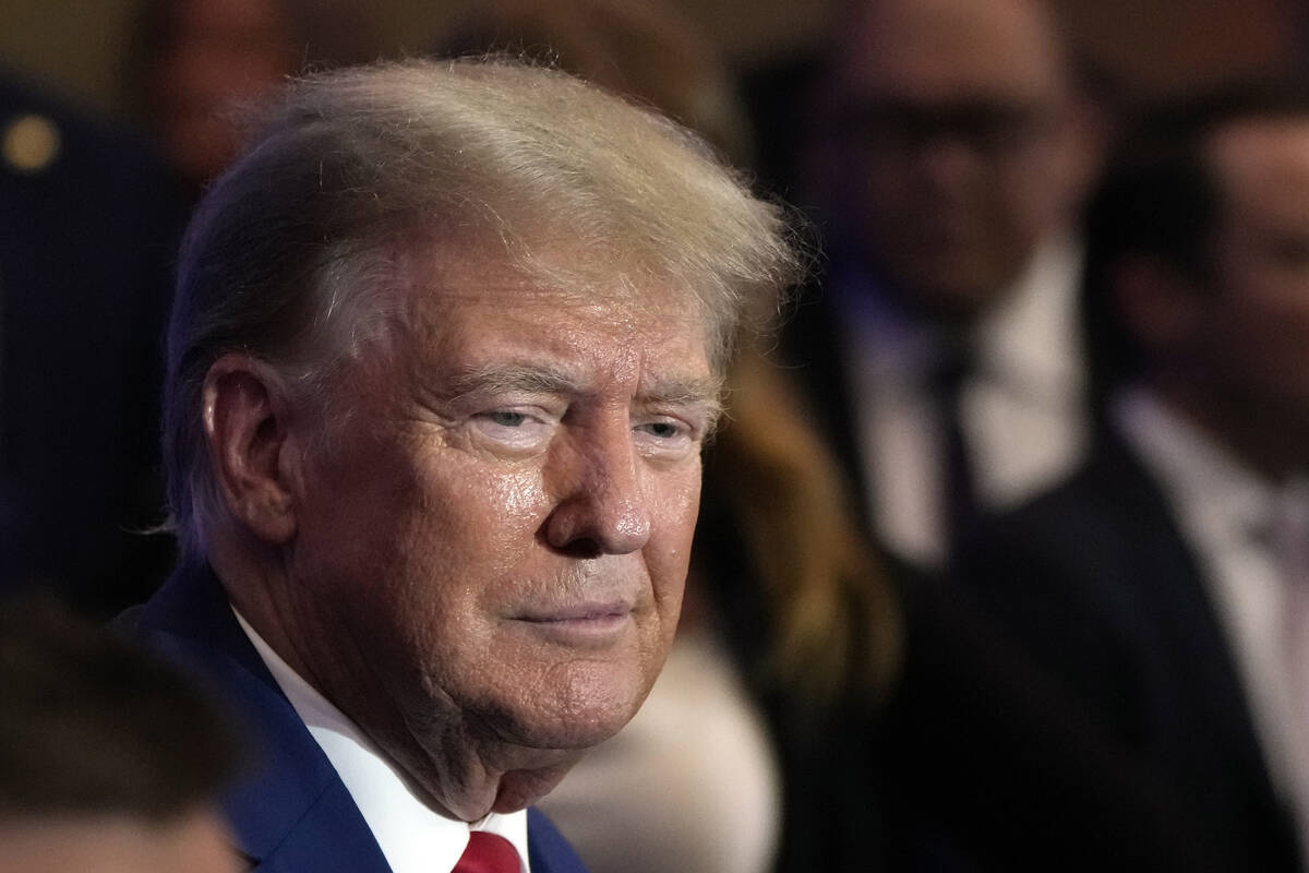 Republican presidential candidate former president Donald Trump greets people after speaking at ...