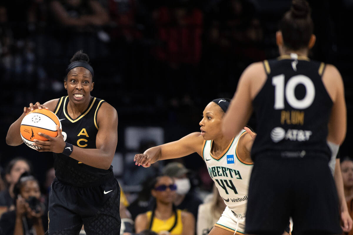 Las Vegas Aces guard Chelsea Gray (12) struggles to communicate with guard Kelsey Plum (10) whi ...