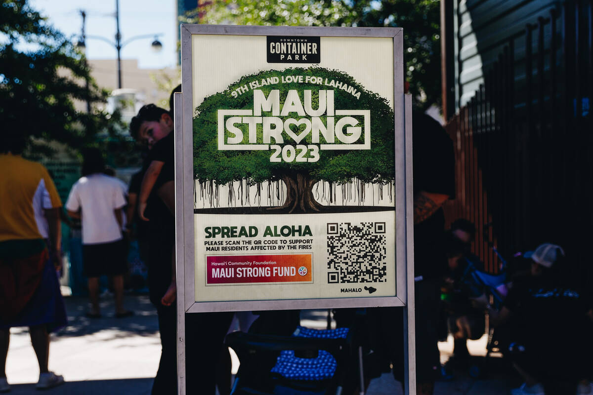 A sign from a fundraiser for victims of the Maui wildfires is seen at Container Park on Sunday, ...
