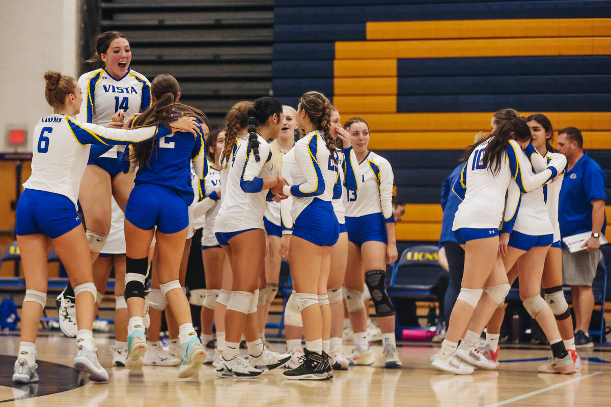 The Sierra Vista girls volleyball team celebrates winning a set in a match up against Legacy at ...