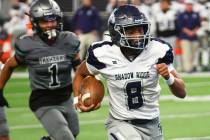 Shadow Ridge quarterback Coen Coloma (8) runs the ball to score a touchdown against Silverado d ...