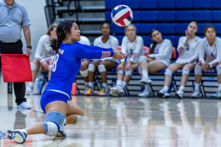 Bishop Gorman's Tatum Thompson (4) extends low for a return versus Faith Lutheran during the se ...