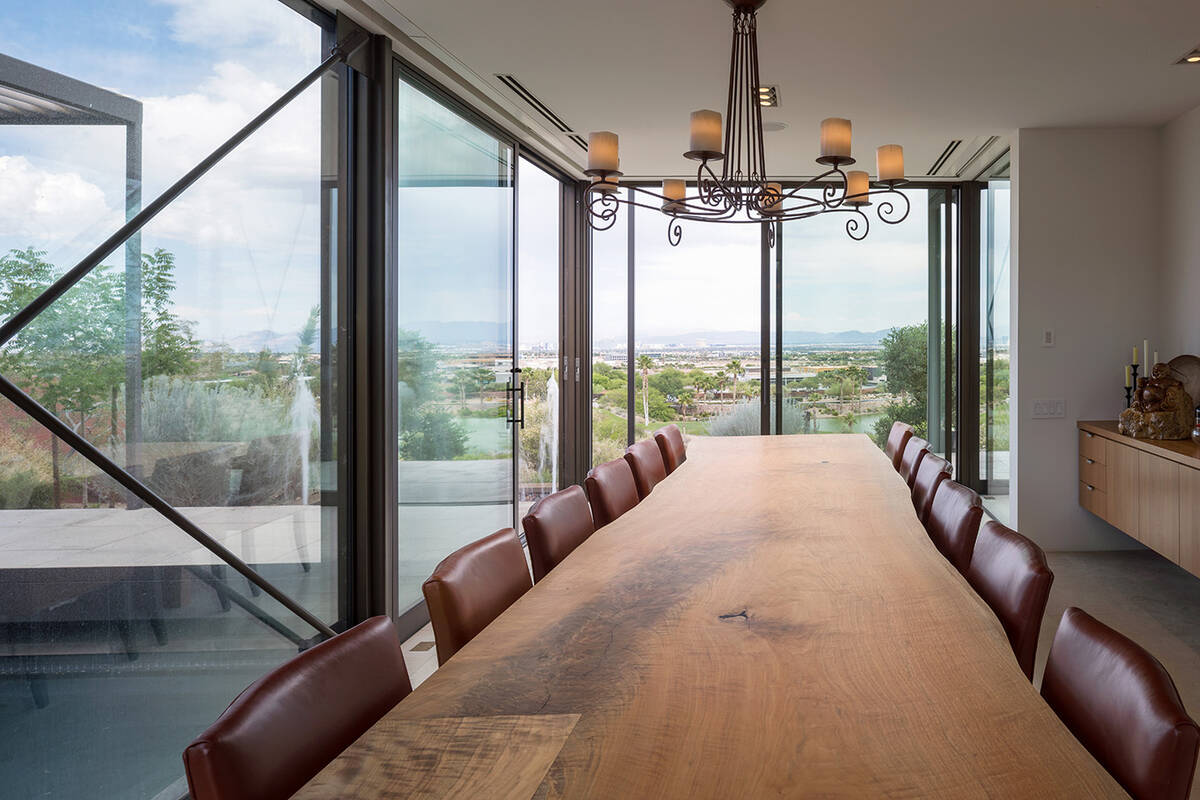 A separate structure houses the dining room. It overlooks the swimming pool and the main house ...