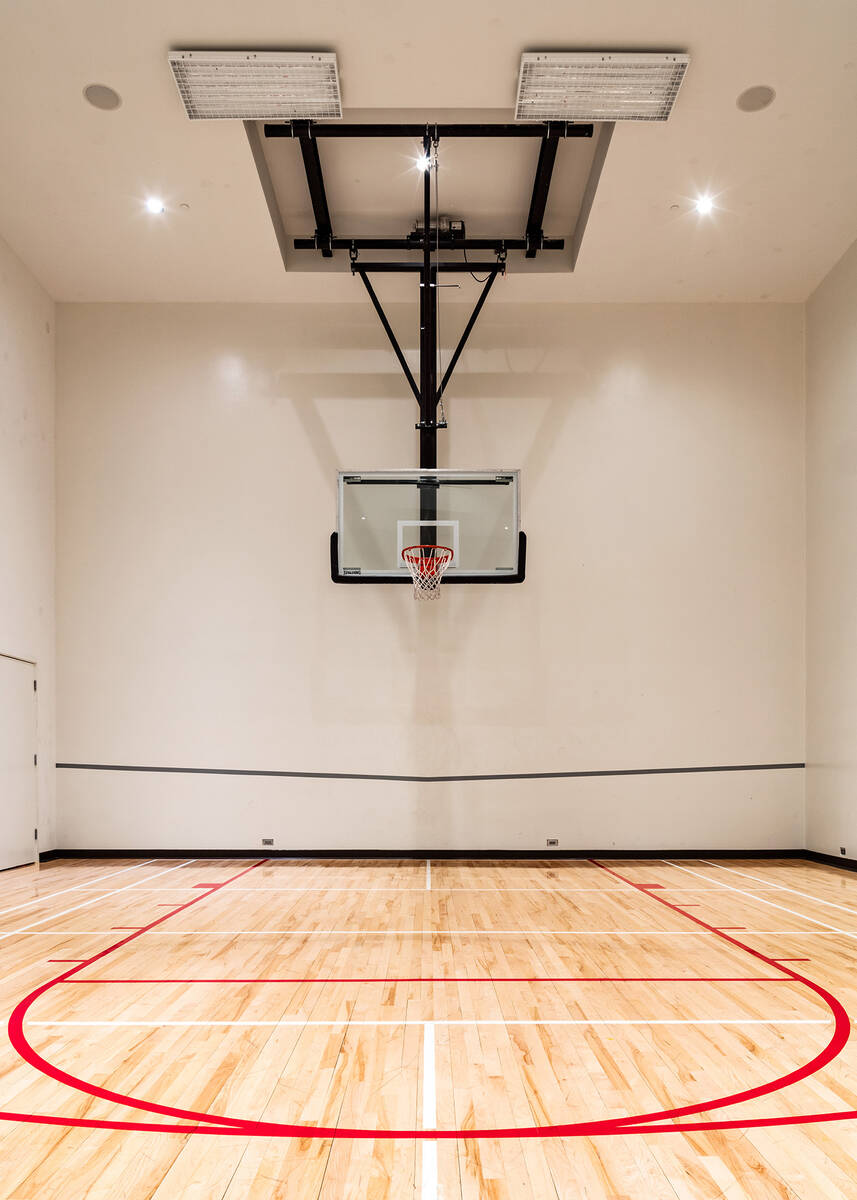 The Summerlin home features an indoor basketball court, along with other special amenities. (IS ...