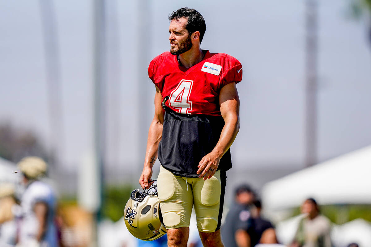 New Orleans Saints quarterback Derek Carr watches drills during a joint NFL football practice w ...
