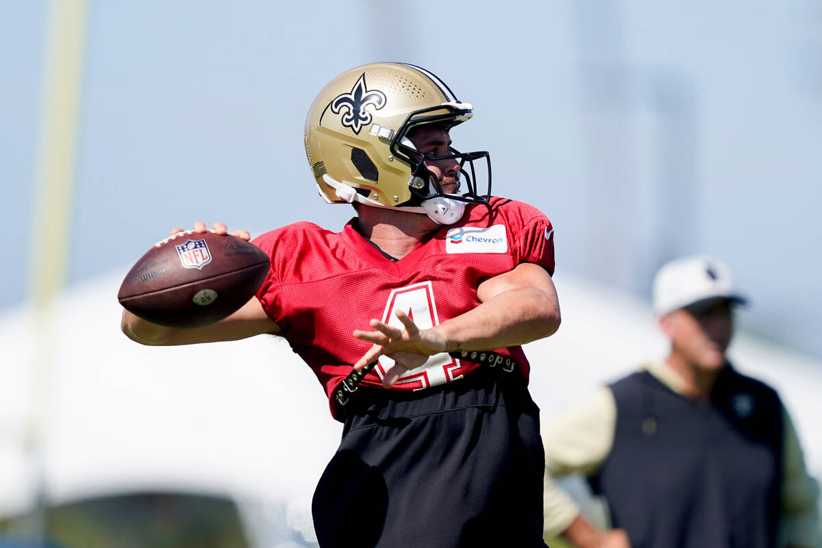 New Orleans Saints quarterback Derek Carr throws during a joint NFL football practice with the ...