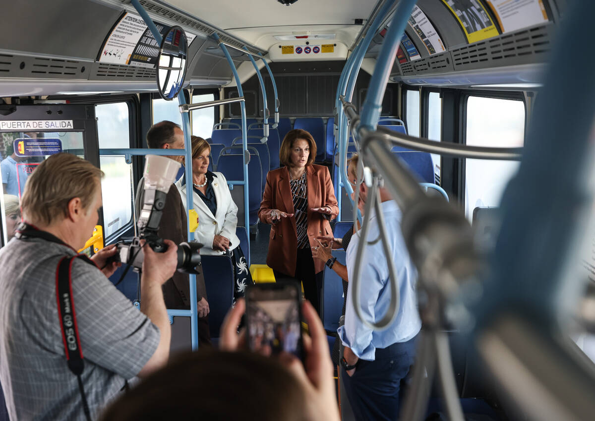 Democratic Rep. Susie Lee, left, and Sen. Catherine Cortez Masto, D-Nev., center, speak with ot ...