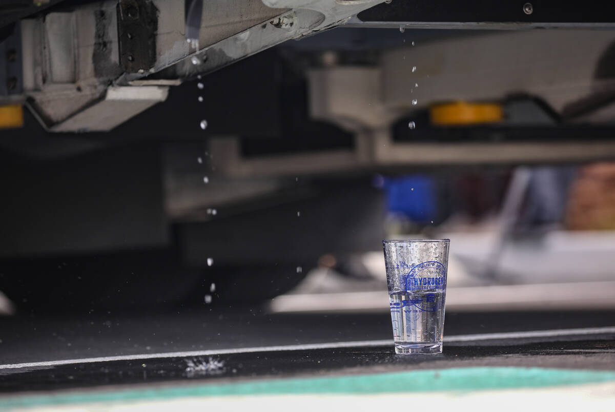 Drinkable water from Vegas’ first hydrogen cell fueled drips into a glass at an unveilin ...