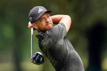Xander Schauffele hits from the fifth tee during the first round of the St. Jude Championship g ...