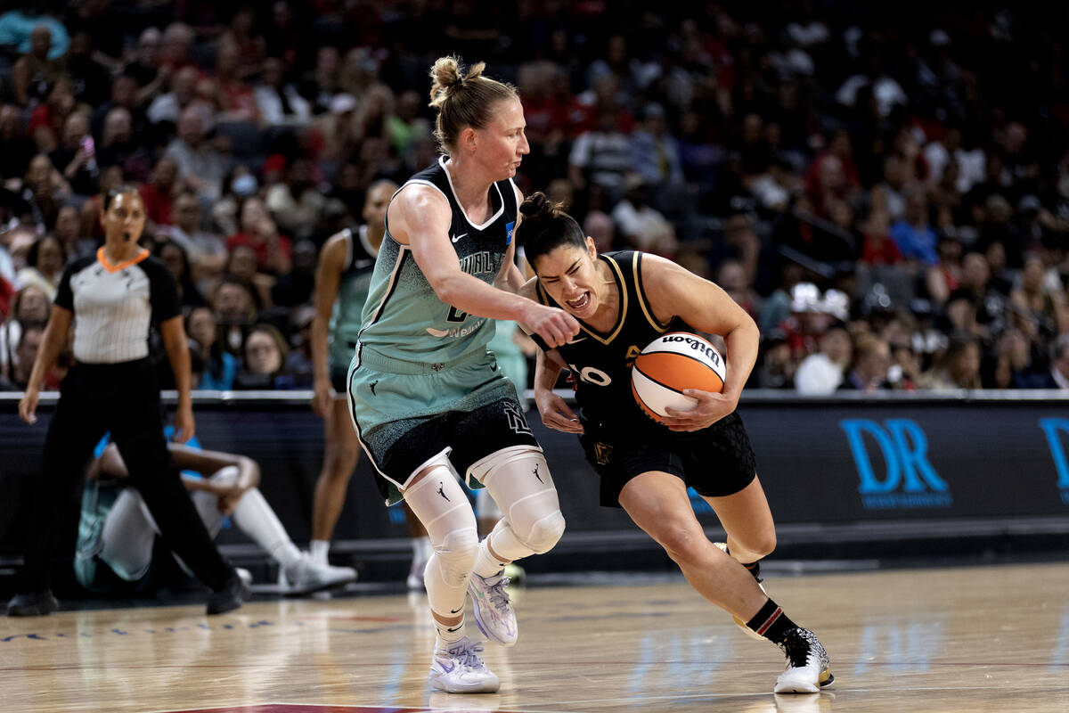 Las Vegas Aces guard Kelsey Plum (10) drives toward the hoop against New York Liberty guard Cou ...