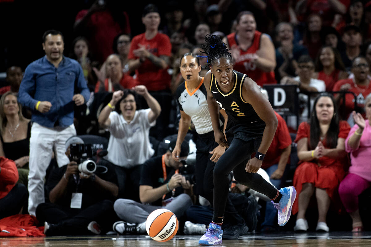 Las Vegas Aces guard Chelsea Gray (12) celebrates after blocking a shot by New York Liberty gua ...