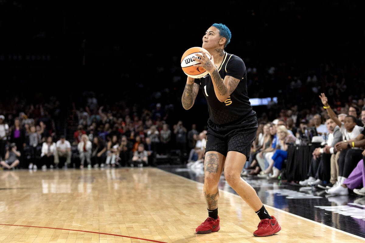 Las Vegas Aces guard Kierstan Bell (1) shoots while the New York Liberty leave her open during ...