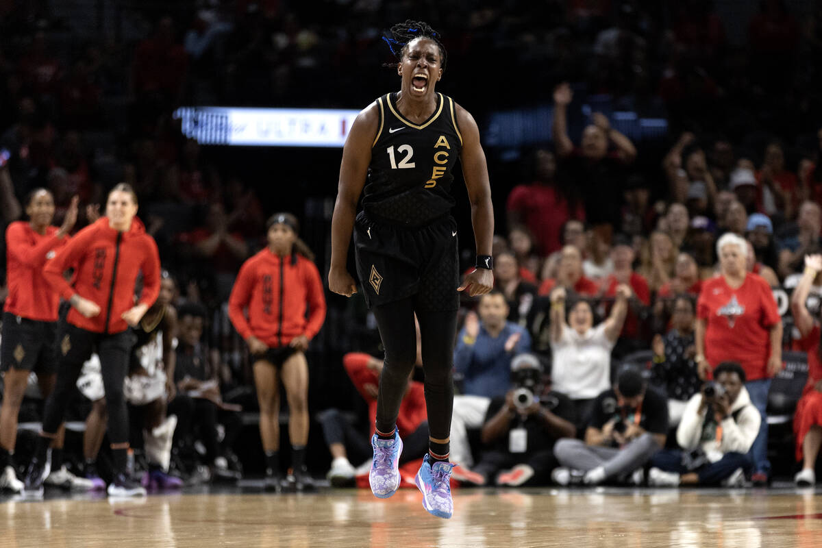 Las Vegas Aces guard Chelsea Gray (12) celebrates after scoring during the second half of a WNB ...