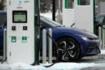 FILE - A Electrify America Charging Station for electric vehicles is seen at Westfield Old Orch ...