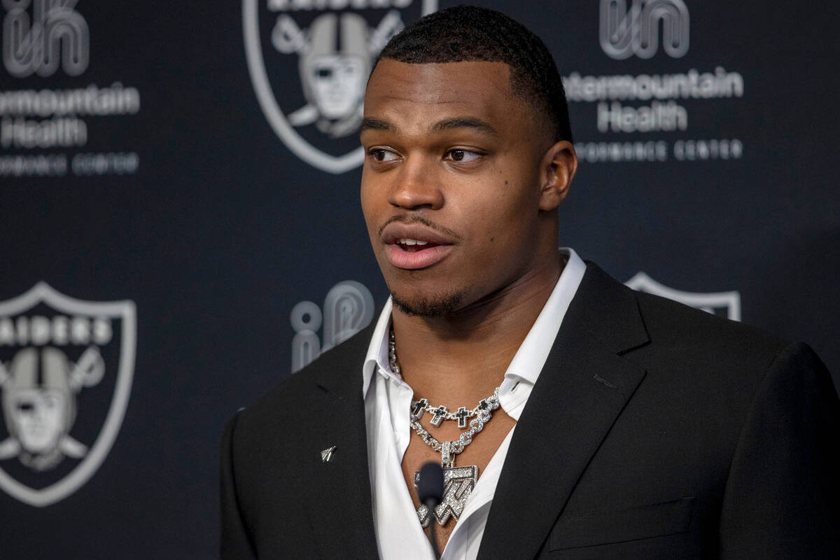 Raiders defensive end Tyree Wilson speaks during his introductory news conference at the Interm ...