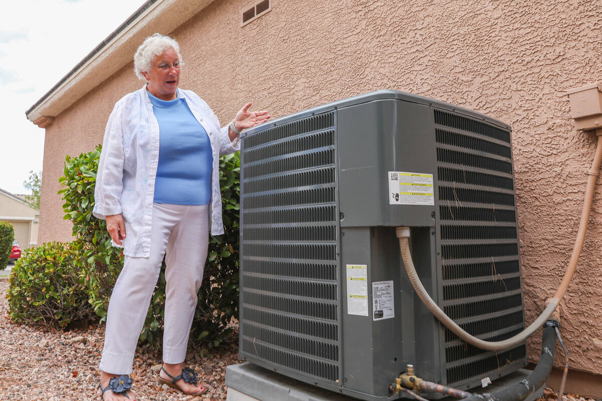 Pamela Williams, a Sun City Anthem resident, stands beside her outdoor AC unit, which was just ...