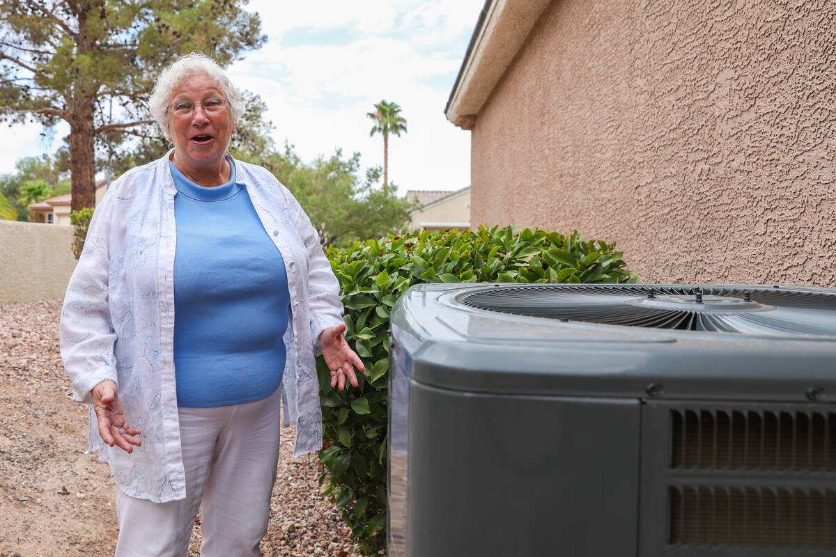 Pamela Williams, a Sun City Anthem resident, stands beside her outdoor AC unit, which was just ...
