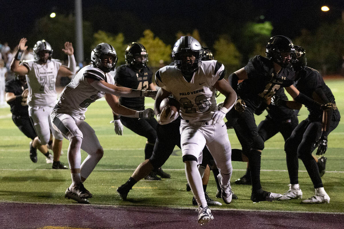 Palo Verde running back Bryant Johnson (20) scores a touchdown during the first half of a high ...