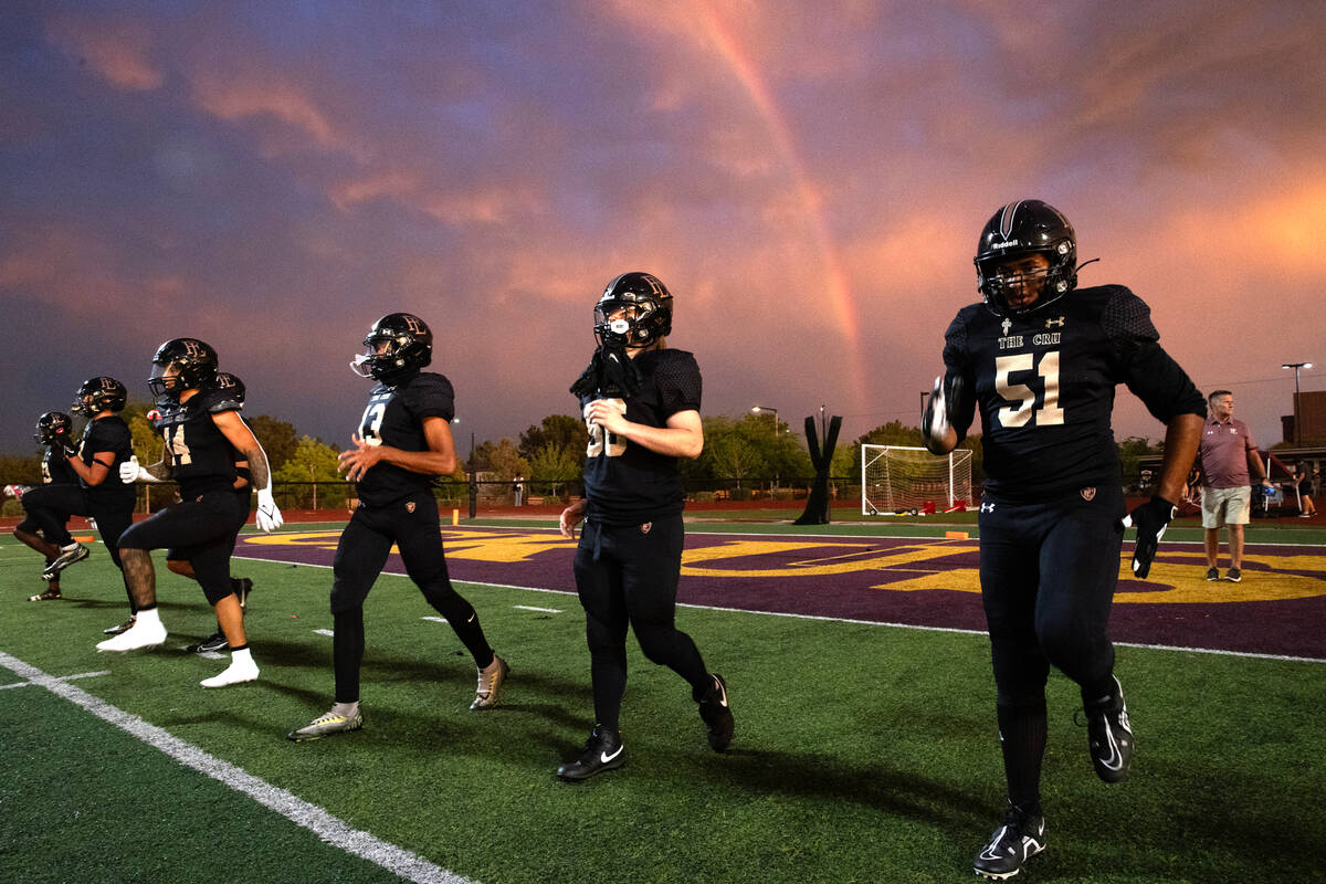 Faith Lutheran warms up before their high school football game against Palo Verde at Faith Luth ...